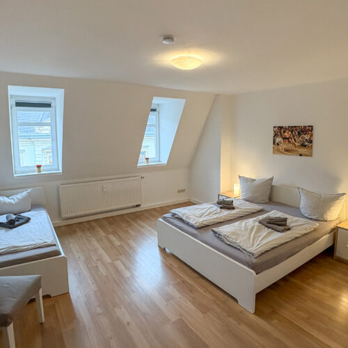 Am Stadtpark - Schlafzimmer 1 mit 3 Betten
